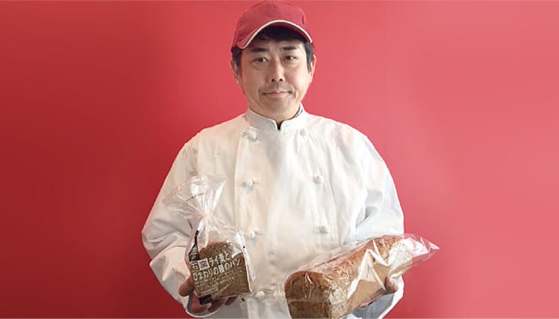 「石窯ライ麦とひまわりの種のパン」の開発を手がけた 株式会社タカキベーカリー 米田伸之さん
